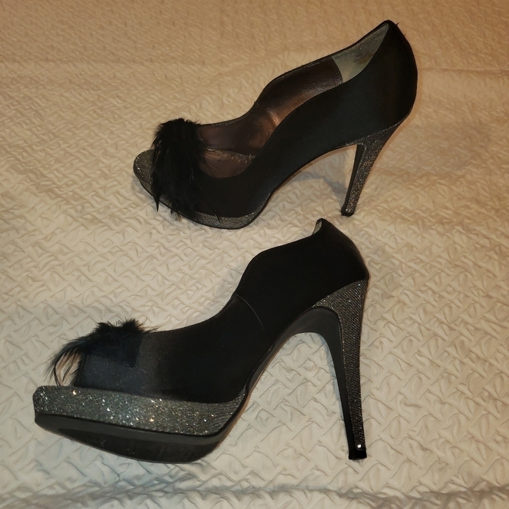 Black Heels With feather Detail.